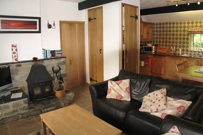 Churn Holiday Cottage Sitting Room With Stove